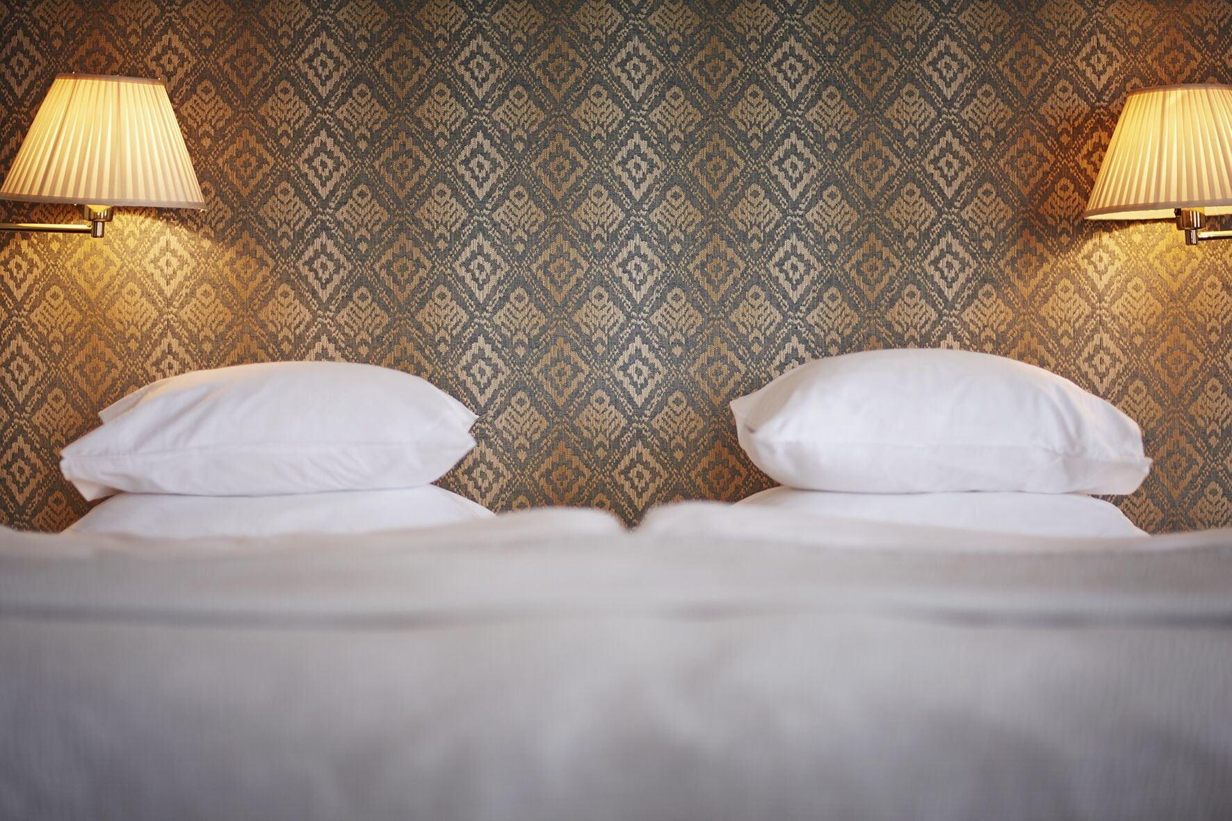 Hotel Diplomat Stockholm Kültér fotó A bed with two pillows